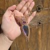 Collar magia violeta