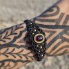 Pulsera granate en latón