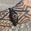 Pulsera granate en latón